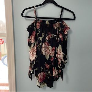 A. Byer floral blouse with elastic band at top and adjustable straps. Size S